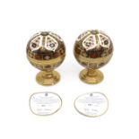 A boxed pair of Royal Crown Derby 1128 Imari pattern barometer globes, with certificates