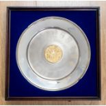 A Danbury Mint silver plate, to commemorate The Queen's Silver Jubilee, limited edition 2119/2500,
