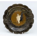 A Japanese spelter dish, set with a papier mache centre, inlaid with bone figure of a geisha, 12