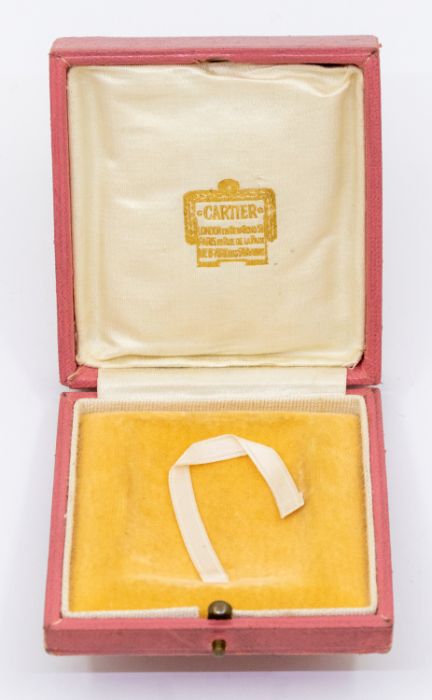 A 1920-30's Cartier box, tooled leather in pale pink, gilt decoration, size 7 x 7.5 x 2.5cm,  silk