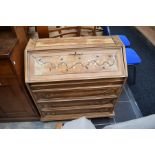 A converted dresser base/ bureau in the 'Chabby chic' manner with pull down door above three drawers