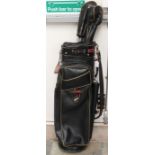 A Slazenger golf club bag, together with two Pat Simmons Great White Irons golf clubs (1 and 3).
