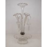 A Victorian glass epergne, four graduated trumpets and three baskets