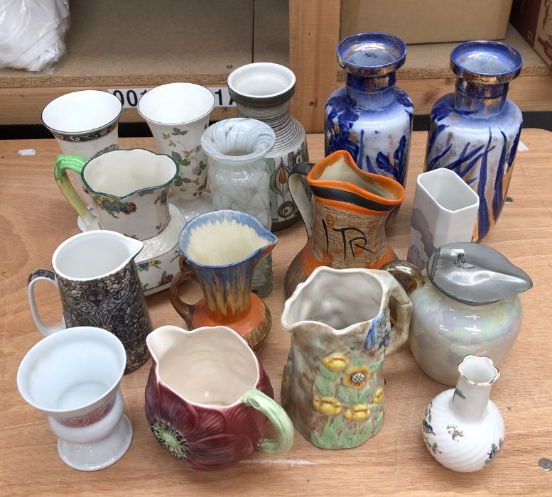 A large collection of ceramic jugs and vases, to include:- Wedgwood examples, Wadeheath and