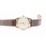 A gents 1950's Timor gold watch, round champagne dial with applied gold tone baton and number