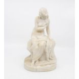 An alabaster figure of a classical nude posed lady