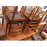 1960s/70s teak kitchen pull-out dining table with four matching leatherette chairs