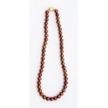 A fresh water cultured pearl necklace, comprising coco coloured pearls, each approx. 8.5mm,