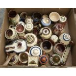 A quantity of Torquay pottery to include teapots, bowls, dishes etc