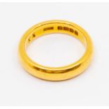 A 22ct gold band, D section, size L,  weight approx. 7.3gms  Condition report: wear and tear