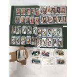Collection of cigarette cards and John Player albums of sets of cards including cigar cards.