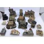 Collection of Lilliputian Lane and other type buildings, some with damage, along with a damaged