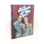 A Morecombe & wise special comedy book signed by both Eric Morecombe & Ernie Wise 1977