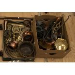A collection of brass and copper wares including nut roasting pans, bed pan, large brass Indian