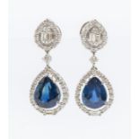 A pair of sapphire and diamond 18ct white gold drop earrings, comprising a tear shape top set to the