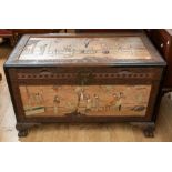 A Chinese 1930's camphor chest, the top, front, sides and back applied with inset carved