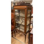 Early 20th Century Edwardian glazed china cabinet, on tapered legs