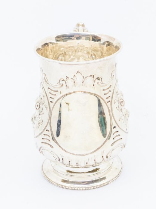 A Victorian silver baluster tankard, profuse chased floral decoration to body, C-scroll handle - Image 3 of 3