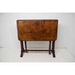 Mid 19th Century, burr walnut veneered Sutherland  table, with turned legs and original castors,