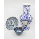 A Chinese blue and white vase, 20th Century; two Oriental bowls (3)