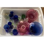 A collection of cobalt blue cut and moulded glass comprising vases, bowls, eye bathes etc together
