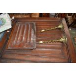 An oak linenfold cabinet pieces; stoneware jar; a pair of brass candlesticks.