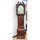 A George III long case clock, painted arched dial, Roman numerals, with date, scroll pediment, oak