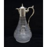 A 19th Century claret jug with etched glass