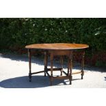 An early 20th Century oak gateleg table