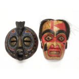 ***Please note description change*** An African Ashanti mask, together a mask of Native American