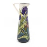Moorcroft slender water jug, circa 1996, cream ground with lilies, in box