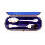 A Victorian silver Christening set comprising fork and spoon, profusely engraved foliate decoration,