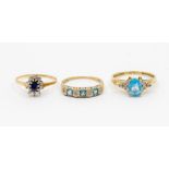 Three 9ct stone set rings, including sapphire and diamond cluster, size T1/2,  two blue topaz