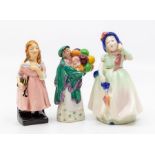 Three Royal Doulton figures including Little Nell, Balloon Seller, Baby