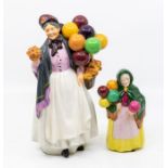 Mid 20th Century Royal Doulton Biddy, Penny Farthing, Balloon Seller, along with WH Goss figure of a