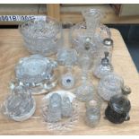 A large collection of glassware, the majority cut glass, including:- an ashtray, bowls, perfume
