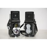 Two vintage Yashica medium format cameras, circa 1980's  Two beautiful examples of twin lens