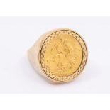 A gents 9ct gold ring set with George V 1915 full sovereign, size U, total gross weight approx. 15.