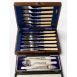 A set of Victorian style EPNS fish knives and forks, in stained wood fitted case together with a