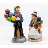 Two Royal Doulton figures of a balloon boy and girl