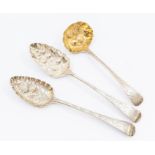 Two George III silver berry spoons, London, 1800 & 1804 together with a George IV sauce ladle,