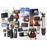 Cameras: A collection of assorted cased and boxed cameras to include: Rollei 35, Olympus, Lumix,