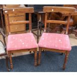 A pair of mid 20th Century pine kitchen chairs