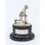 A modern silver trophy cast as a Gentleman playing bowls, import marks London, 1967, on ebonised