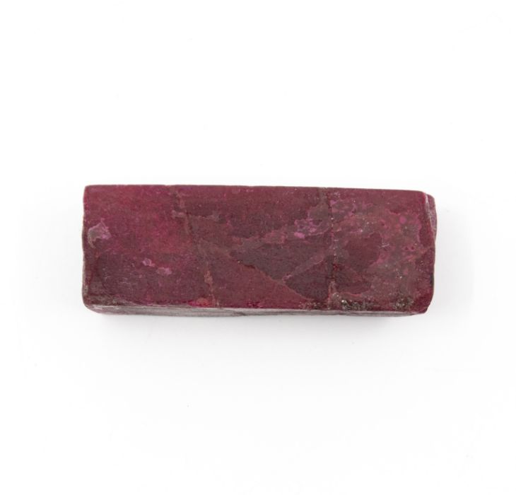 A piece of dyed rough ruby, weight approx 352.10carats, length approx 50mm x 21mm x 20mm, along with