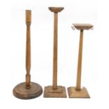 Three early 20th Century wig stands