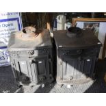 A pair of cast iron wood burning stoves (2)