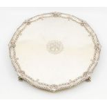 A George III silver large salver, gadroon border with festoon and floral band, the centre engraved