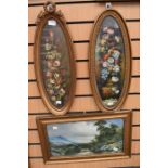 Pair of early 20th century oval framed still lives signed behind the glass along with a print.