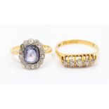 An early 20th Century sapphire and diamond 18ct gold dress ring, comprising an oval sapphire doublet